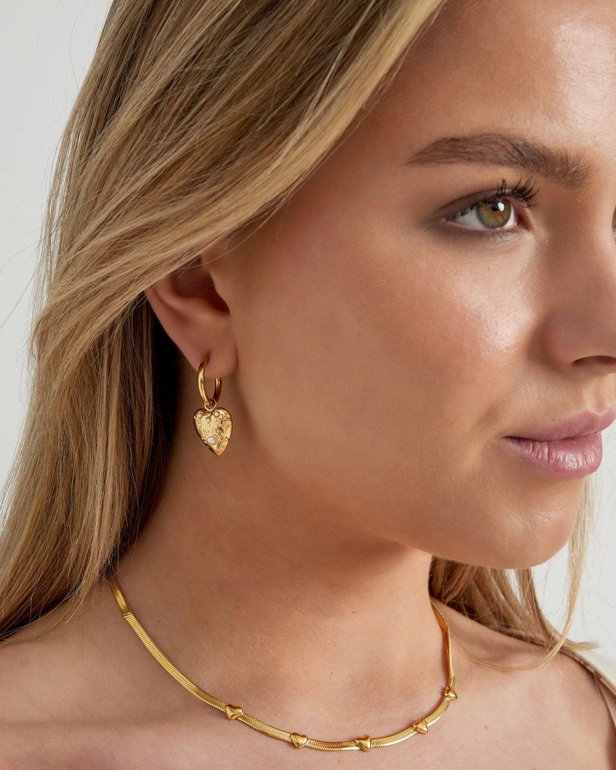 ‘Pearly heart’ oorbellen goud